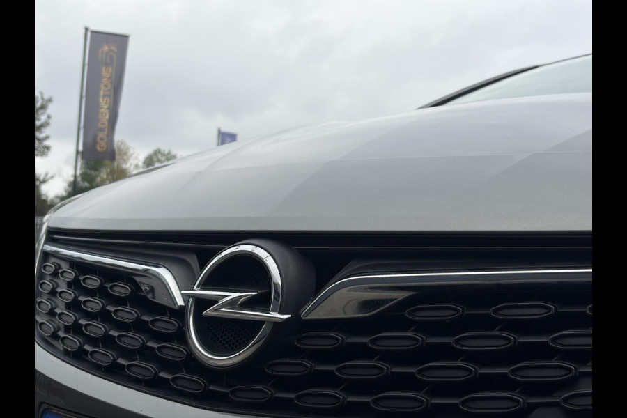 Opel Astra Sports Tourer 1.2 Elegance ✓131pk✓2e Eigenaar✓Camera✓Carplay✓6 Bak✓Stoelverw✓Stuurverw✓Pdc V+A✓Recent beurt gehad✓Clima✓Cruise✓Halfleder✓Keyless✓N.A.P✓Lm velgen✓Rijstrooksensor✓Apk tot 07-2027