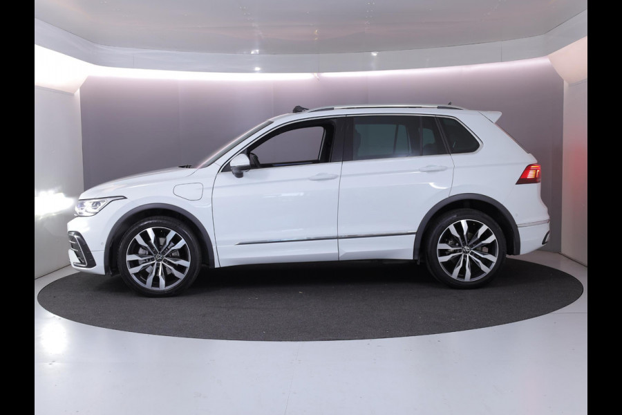 Volkswagen Tiguan 1.4 TSI eHybrid R-Line Business 245 pk Automaat (DSG) | Private lease vanaf €766 | Navigatie | Panoramadak | Park assist | Rondomzicht camera | Head-up display | Lederen bekleding | Elektr. voorstoelen met geheugen | R-Line |