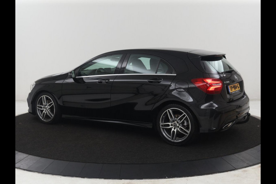 Mercedes-Benz A-Klasse 180 Business Solution AMG | Leder/alcantara | Stoelverwarming | Cruise control | Navigatie | Bluetooth | Camera | Park assist | Trekhaak