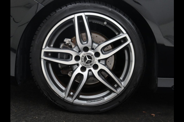 Mercedes-Benz A-Klasse 180 Business Solution AMG | Leder/alcantara | Stoelverwarming | Cruise control | Navigatie | Bluetooth | Camera | Park assist | Trekhaak