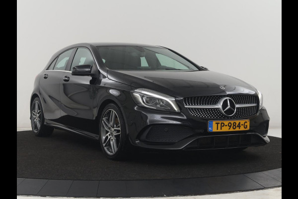 Mercedes-Benz A-Klasse 180 Business Solution AMG | Leder/alcantara | Stoelverwarming | Cruise control | Navigatie | Bluetooth | Camera | Park assist | Trekhaak