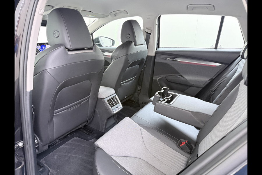 Škoda ENYAQ iV 80 204PK SOH 91% Verlichte Grille Trekhaak Stoel+Stuurverwarming 3-Zone Ecc Camera Apple Carplay Android Auto Navi Sport Pakket Led Matrix Rijstrooksensor Isofix Keyless 1.000KG Trekgewicht Origineel Nederlandse Auto