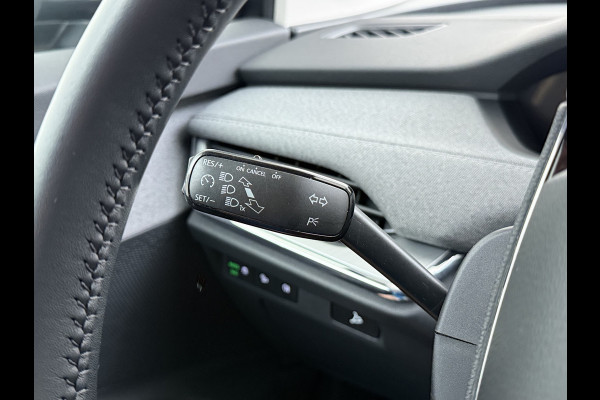 Škoda ENYAQ iV 80 204PK SOH 91% Verlichte Grille Trekhaak Stoel+Stuurverwarming 3-Zone Ecc Camera Apple Carplay Android Auto Navi Sport Pakket Led Matrix Rijstrooksensor Isofix Keyless 1.000KG Trekgewicht Origineel Nederlandse Auto
