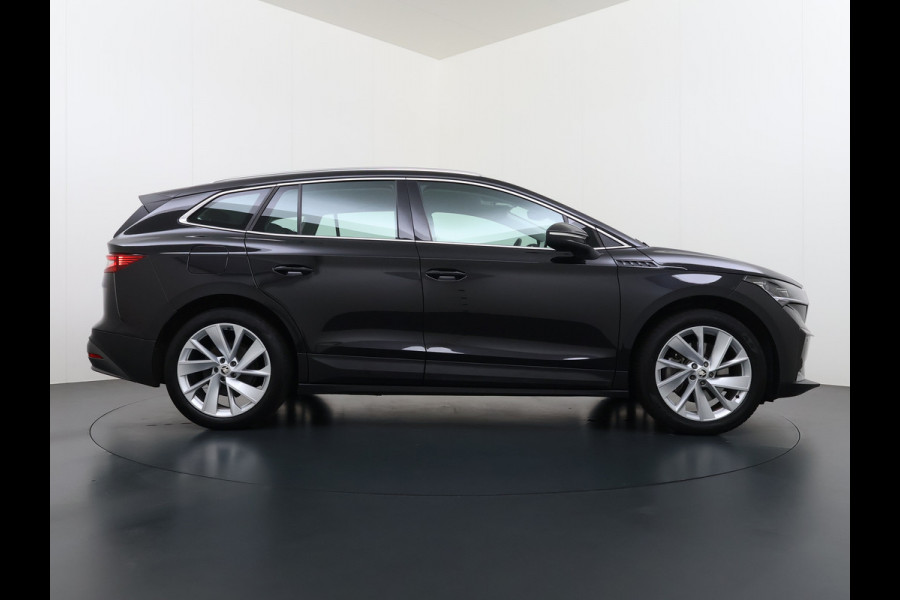 Škoda ENYAQ iV 80 204PK SOH 91% Verlichte Grille Trekhaak Stoel+Stuurverwarming 3-Zone Ecc Camera Apple Carplay Android Auto Navi Sport Pakket Led Matrix Rijstrooksensor Isofix Keyless 1.000KG Trekgewicht Origineel Nederlandse Auto