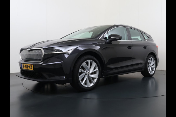 Škoda ENYAQ iV 80 204PK SOH 91% Verlichte Grille Trekhaak Stoel+Stuurverwarming 3-Zone Ecc Camera Apple Carplay Android Auto Navi Sport Pakket Led Matrix Rijstrooksensor Isofix Keyless 1.000KG Trekgewicht Origineel Nederlandse Auto