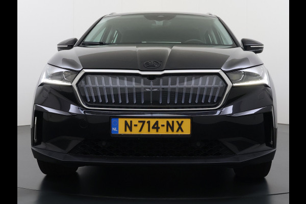Škoda ENYAQ iV 80 204PK SOH 91% Verlichte Grille Trekhaak Stoel+Stuurverwarming 3-Zone Ecc Camera Apple Carplay Android Auto Navi Sport Pakket Led Matrix Rijstrooksensor Isofix Keyless 1.000KG Trekgewicht Origineel Nederlandse Auto