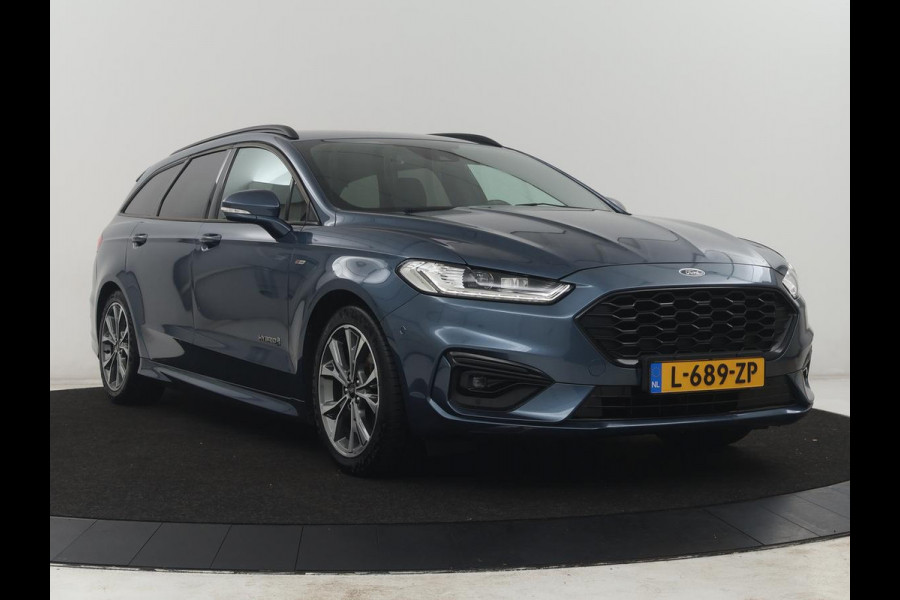 Ford Mondeo Wagon 2.0 IVCT HEV St-Line | Leder/alcantara | Memory | Cruise control | Dodehoek detectie | Stuur/stoel verwarming | Achterbank verwarming | Carplay | Camera | Park assist | Elektrische achterklep