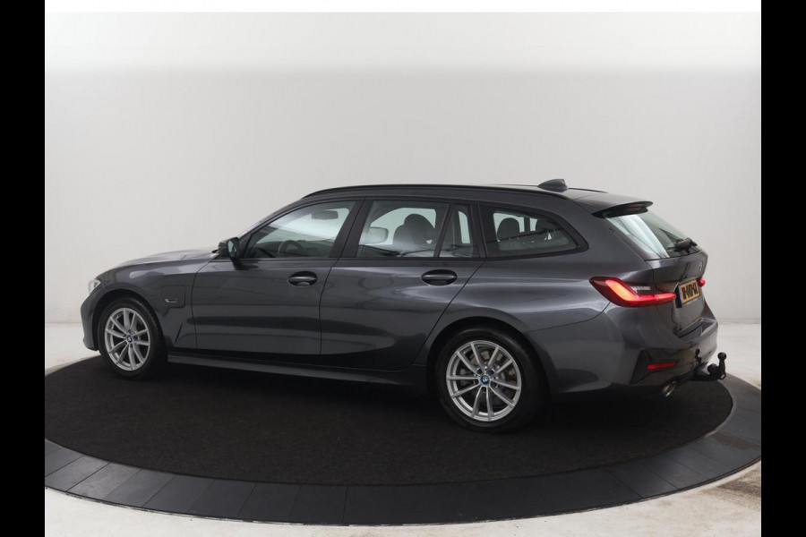 BMW 3 Serie Touring 320e Business Edition Plus | SOH 84,2% | Leder | Cruise control | Stoelverwarming | Climate control | 3 zone klimaat | Navigatie | Bluetooth | Elektrische achterklep | Trekhaak