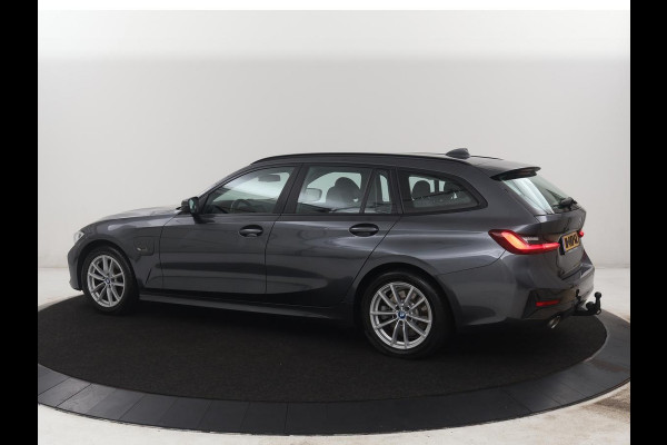 BMW 3 Serie Touring 320e Business Edition Plus | SOH 84,2% | Leder | Cruise control | Stoelverwarming | Climate control | 3 zone klimaat | Navigatie | Bluetooth | Elektrische achterklep | Trekhaak