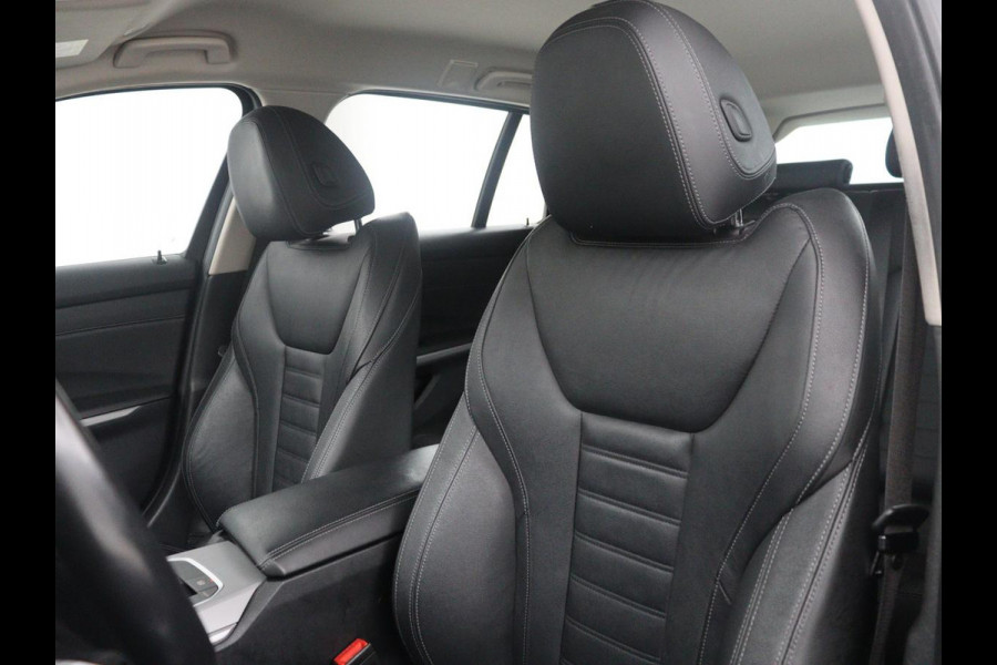 BMW 3 Serie Touring 320e Business Edition Plus | SOH 84,2% | Leder | Cruise control | Stoelverwarming | Climate control | 3 zone klimaat | Navigatie | Bluetooth | Elektrische achterklep | Trekhaak