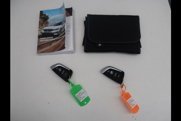 BMW 3 Serie Touring 320e Business Edition Plus | SOH 84,2% | Leder | Cruise control | Stoelverwarming | Climate control | 3 zone klimaat | Navigatie | Bluetooth | Elektrische achterklep | Trekhaak