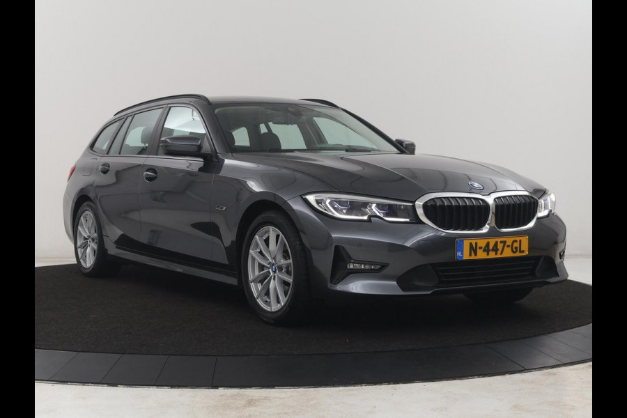 BMW 3 Serie Touring 320e Business Edition Plus | SOH 84,2% | Leder | Cruise control | Stoelverwarming | Climate control | 3 zone klimaat | Navigatie | Bluetooth | Elektrische achterklep | Trekhaak