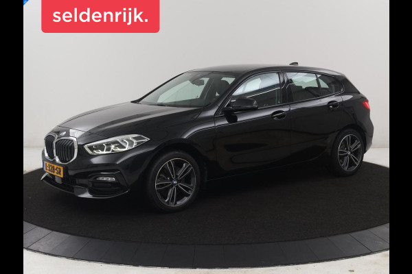 BMW 1-serie 118i Business Edition | Half leder | Cruise control | Stoelverwarming | Navigatie | Carplay | Park assist | Climate control | Virtual dashboard | 17" velgen