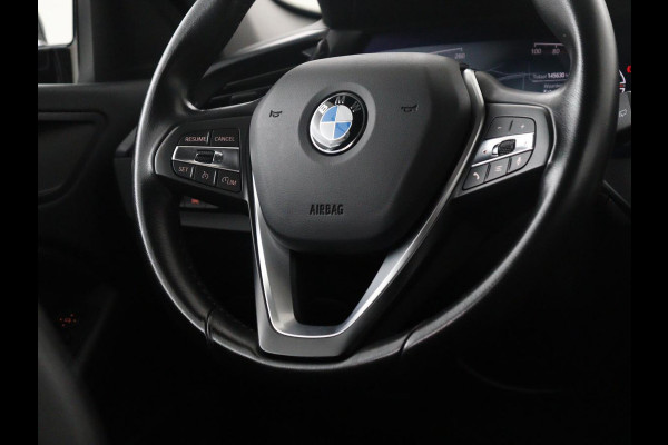 BMW 1-serie 118i Business Edition | Half leder | Cruise control | Stoelverwarming | Navigatie | Carplay | Park assist | Climate control | Virtual dashboard | 17" velgen