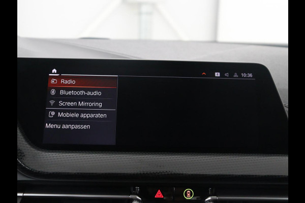 BMW 1-serie 118i Business Edition | Half leder | Cruise control | Stoelverwarming | Navigatie | Carplay | Park assist | Climate control | Virtual dashboard | 17" velgen