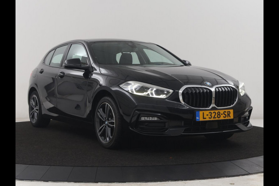 BMW 1-serie 118i Business Edition | Half leder | Cruise control | Stoelverwarming | Navigatie | Carplay | Park assist | Climate control | Virtual dashboard | 17" velgen