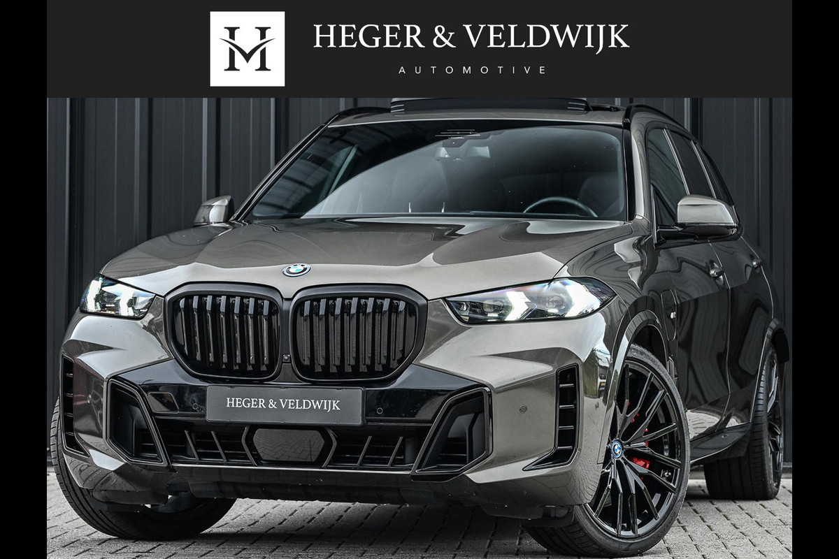BMW X5 xDrive50e M-Sport Pro | Panoramadak | Achterasbesturing | Massage + Ventilatie | Sky Lounge | 360 Camera | Active Cruise | Harman/Kardon | Iconic Glow | BMW Gesture Control | HUD | Soft Close | Luchtvering | Trekhaak |