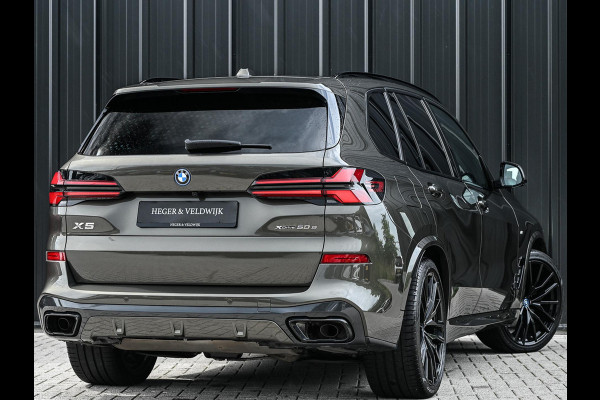 BMW X5 xDrive50e M-Sport Pro | Panoramadak | Achterasbesturing | Massage + Ventilatie | Sky Lounge | 360 Camera | Active Cruise | Harman/Kardon | Iconic Glow | BMW Gesture Control | HUD | Soft Close | Luchtvering | Trekhaak |