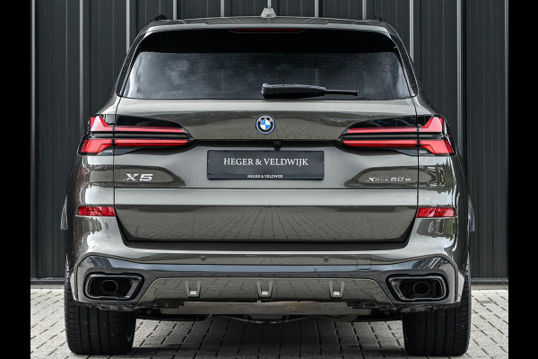 BMW X5 xDrive50e M-Sport Pro | Panoramadak | Achterasbesturing | Massage + Ventilatie | Sky Lounge | 360 Camera | Active Cruise | Harman/Kardon | Iconic Glow | BMW Gesture Control | HUD | Soft Close | Luchtvering | Trekhaak |