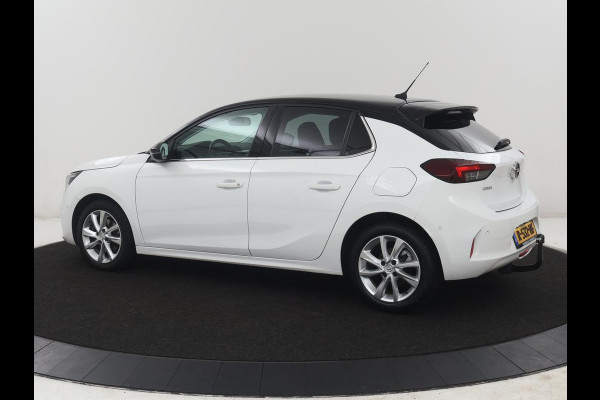 Opel Corsa 1.2 Elegance | Half leder | Cruise control | Dodehoek detectie | Stuur/stoel verwarming | Climate control | Navigatie | CarPlay | Camera | Park assist | Trekhaak