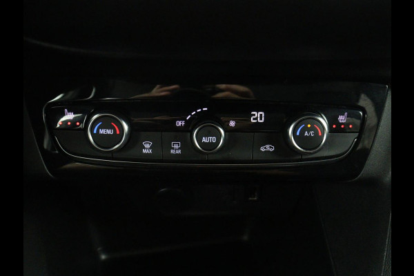 Opel Corsa 1.2 Elegance | Half leder | Cruise control | Dodehoek detectie | Stuur/stoel verwarming | Climate control | Navigatie | CarPlay | Camera | Park assist | Trekhaak