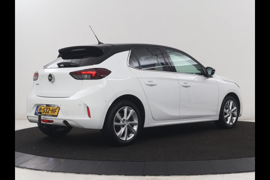 Opel Corsa 1.2 Elegance | Half leder | Cruise control | Dodehoek detectie | Stuur/stoel verwarming | Climate control | Navigatie | CarPlay | Camera | Park assist | Trekhaak