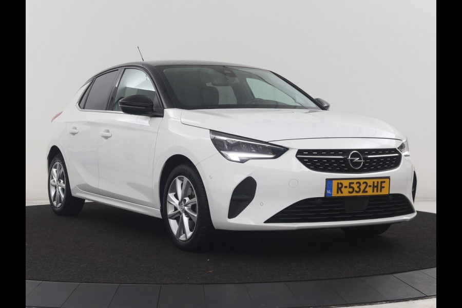 Opel Corsa 1.2 Elegance | Half leder | Cruise control | Dodehoek detectie | Stuur/stoel verwarming | Climate control | Navigatie | CarPlay | Camera | Park assist | Trekhaak