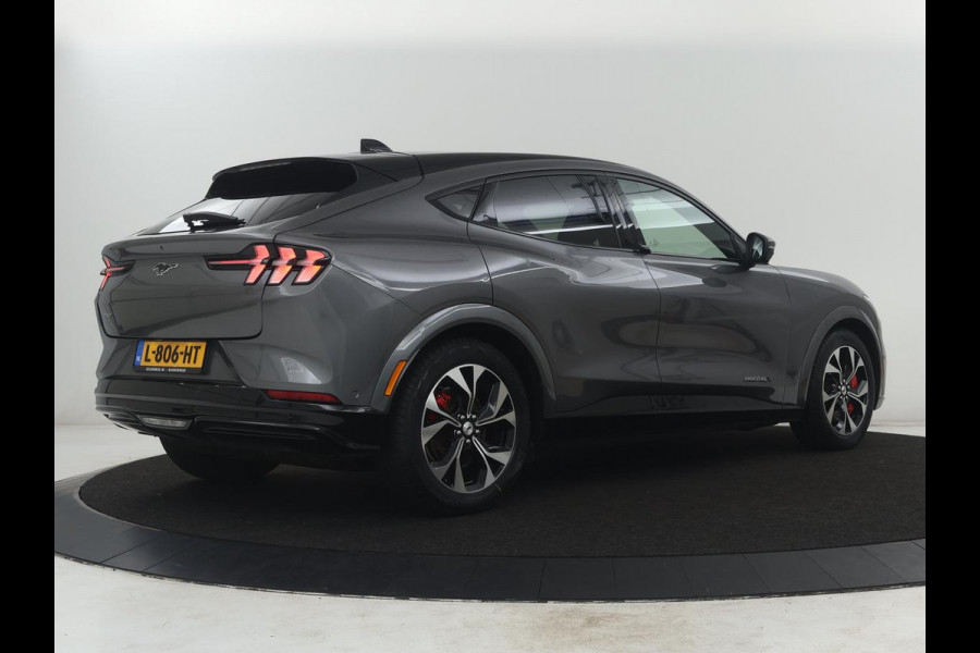 Ford Mustang Mach-E Extended First Edition AWD 98 kWh | SOH 92,4% | Leder | Panoramadak | Memory | Dodehoek detectie | Adaptive cruise | Stuur/stoelverwarming | 360 camera | Park assist | Elektrische achterklep