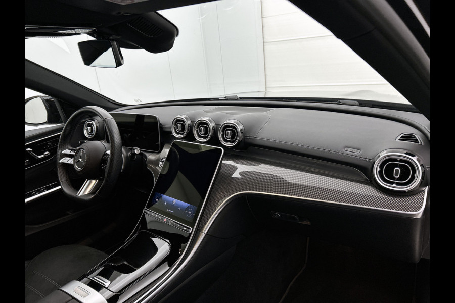 Mercedes-Benz C-Klasse Estate 300 e Business Solution AMG AMG Line | Night Pakket | Panorama Schuif-Kanteldak | Parkeerpakket met 360°-camera | Alarm Klasse 3. Inclusief 24 maanden Mercedes-Benz Certified garantie voor Europa.