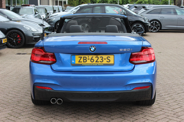 BMW 2 Serie Cabrio 220i High Exe. M Sport / 54.228 km/ NL Auto / Leder / CarPlay / Parkeerhulp V+A / 18'' / Windscherm / Sportstoelen / Stoelverwarming / DAB / Cruise Control