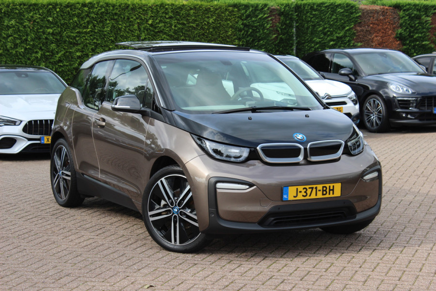 BMW i3 Executive Edition 120Ah 42 kWh / SoH 92,8% / Panoramadak / Camera / Navigatie / 20'' / DAB / Stoelverwarming / Warmtepomp / Cruise Control