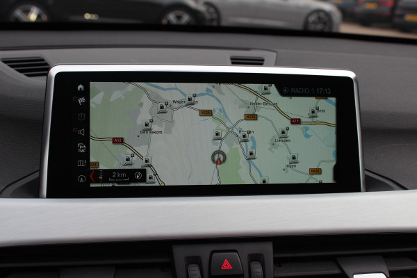 BMW X1 xDrive20i High Exe. M Sport 70.615 km! / Panoramadak / Camera / Head-up / Leder / Navigatie / 18'' / Stuur+Stoelverwarming / Cruise Control