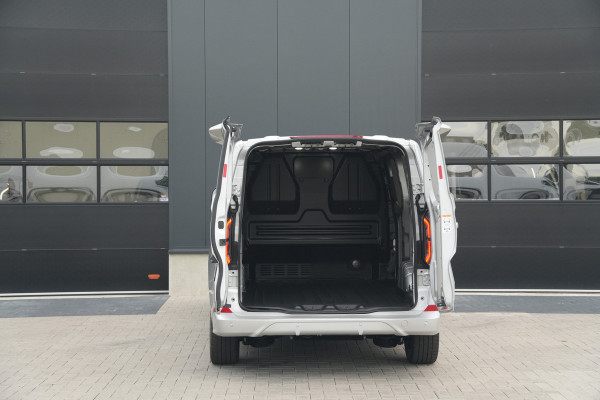 Ford E-Transit Custom 340 L2H1 Sport 71 kWh 218pk - 2x Schuif - ACC - B&O - Navi - Stoel/Stuurverwarming - 360 Camera - Trekhaak - Rijklaar