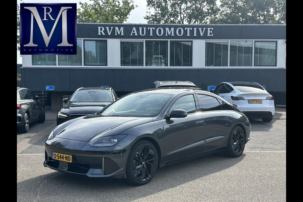 Hyundai IONIQ 6 First Edition AWD 77.4 kWh SOH 100% | PANO | STOEL VERWAMRING VOOR & ACHTER | MEM. SEAT | ELEK. STOELEN | BOSE BOXEN | 360 CAMERA | FABRIEKS GARANTIE TM 03-2028 | RIJKLAAR ! |