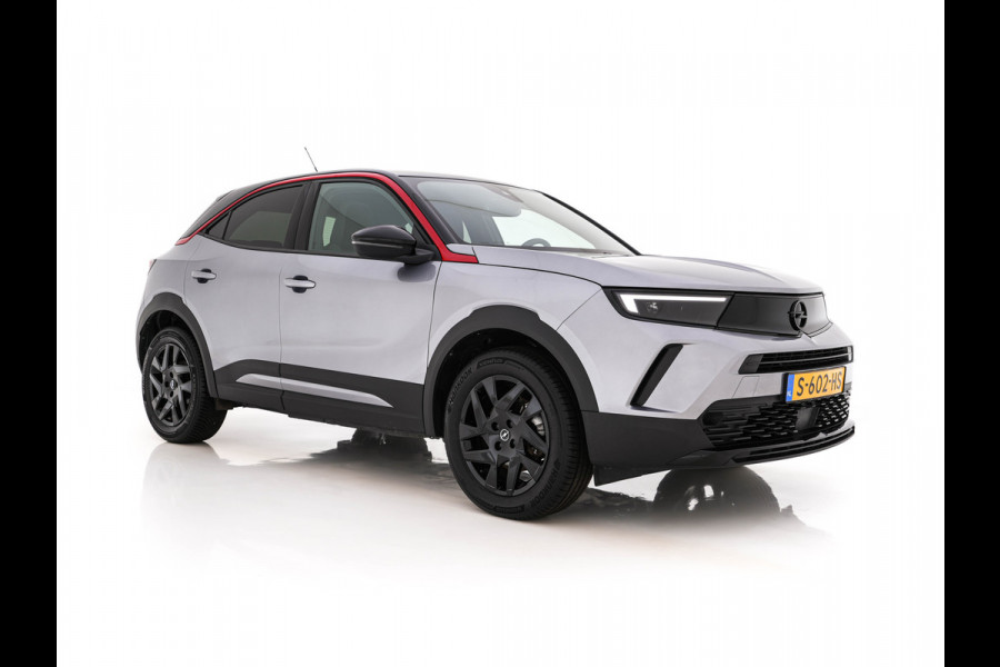 Opel Mokka Electric Level 4 50 kWh [3-Fase-11kW] {SoH-95%} (INCL.BTW) Aut. *HEATPUMP | LEATHER-FABRIC | DIGI-COCKPIT | FULL-LED | CAMERA | COMFORTSEATS | KEYLESS | DAB+ | ECC | CRUISE | 17''ALU*