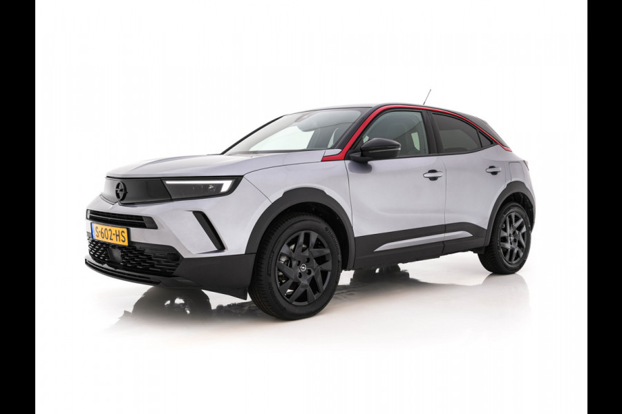 Opel Mokka Electric Level 4 50 kWh [3-Fase-11kW] {SoH-95%} (INCL.BTW) Aut. *HEATPUMP | LEATHER-FABRIC | DIGI-COCKPIT | FULL-LED | CAMERA | COMFORTSEATS | KEYLESS | DAB+ | ECC | CRUISE | 17''ALU*