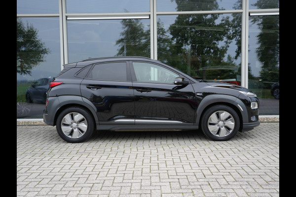 Hyundai Kona EV Premium 64 kWh | Head-up display | stuur verwarmd | Cruise control adaptief | Apple Carplay/Android Auto