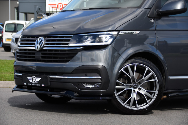 Volkswagen Transporter 2.0 TDI L2H1 32 DC Caravelle Virtual, Adaptieve Cruise, Carplay, LED, Leder, 2 x Electrische deur, Automaat, Clima, Stoelverwarming, Uniek! Bulli / Highline