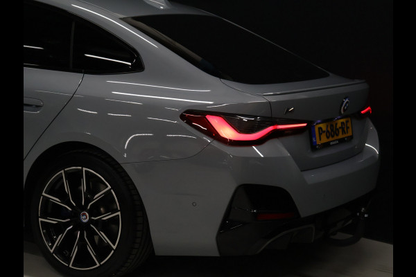 BMW i4 M50 High Executive 84 kWh [TREKHAAK, APPLE CARPLAY, HEAD-UP DISPLAY, STOELVERWARMING, CRUISE CONTROL, CAMERA, PDC V+A, ELEKTRISCHE ACHTERKLEP, NAVIGATIE, LED, LEDER, NIEUWSTAAT]