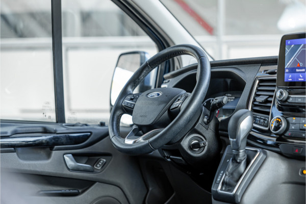 Ford Transit Custom 320 2.0 TDCI L2H1 Platinum Edition DC | Bi-Xenon | Navigatie | CarPlay | Camera | Lederen bekleding | Stoelverwarming | L+R Schuifdeur | DAB | Dubbel cabine | Nieuwe APK | Euro 6