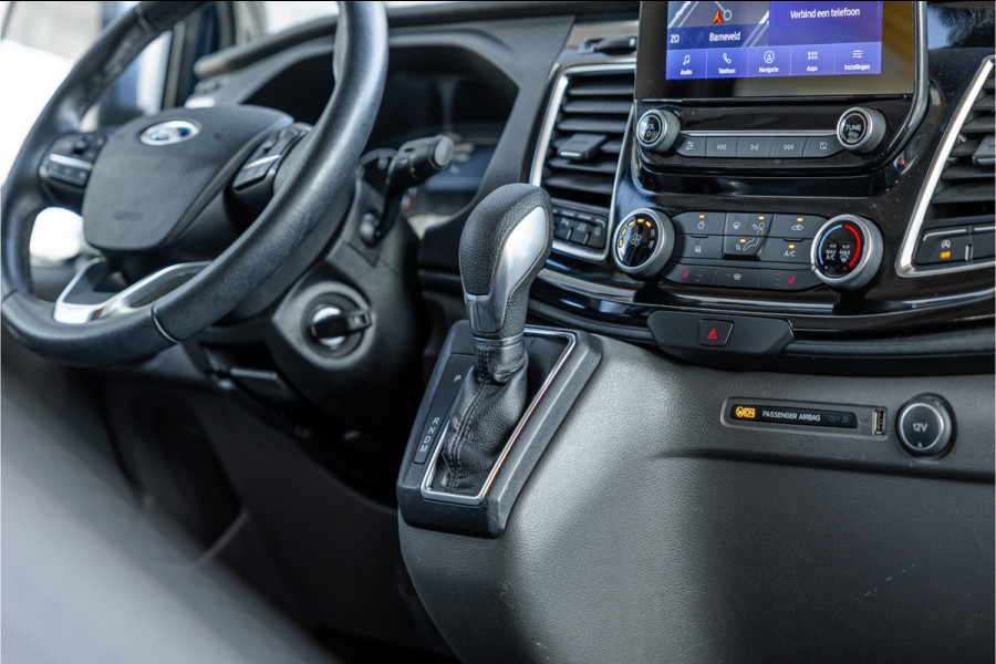 Ford Transit Custom 320 2.0 TDCI L2H1 Platinum Edition DC | Bi-Xenon | Navigatie | CarPlay | Camera | Lederen bekleding | Stoelverwarming | L+R Schuifdeur | DAB | Dubbel cabine | Nieuwe APK | Euro 6