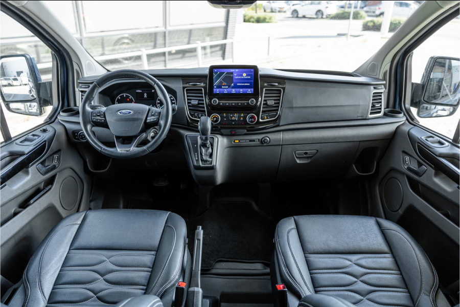 Ford Transit Custom 320 2.0 TDCI L2H1 Platinum Edition DC | Bi-Xenon | Navigatie | CarPlay | Camera | Lederen bekleding | Stoelverwarming | L+R Schuifdeur | DAB | Dubbel cabine | Nieuwe APK | Euro 6