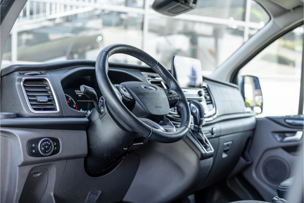Ford Transit Custom 320 2.0 TDCI L2H1 Platinum Edition DC | Bi-Xenon | Navigatie | CarPlay | Camera | Lederen bekleding | Stoelverwarming | L+R Schuifdeur | DAB | Dubbel cabine | Nieuwe APK | Euro 6