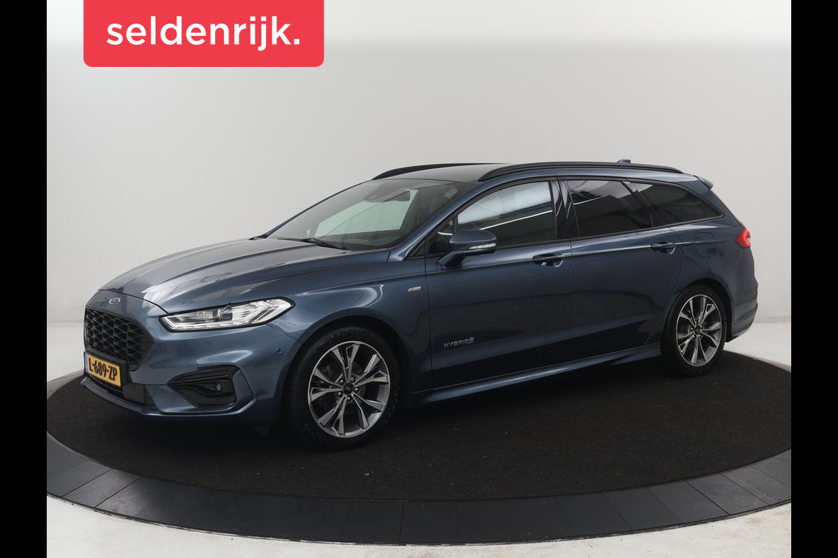 Ford Mondeo Wagon 2.0 IVCT HEV St-Line | Leder/alcantara | Memory | Cruise control | Dodehoek detectie | Stuur/stoel verwarming | Achterbank verwarming | Carplay | Camera | Park assist | Elektrische achterklep