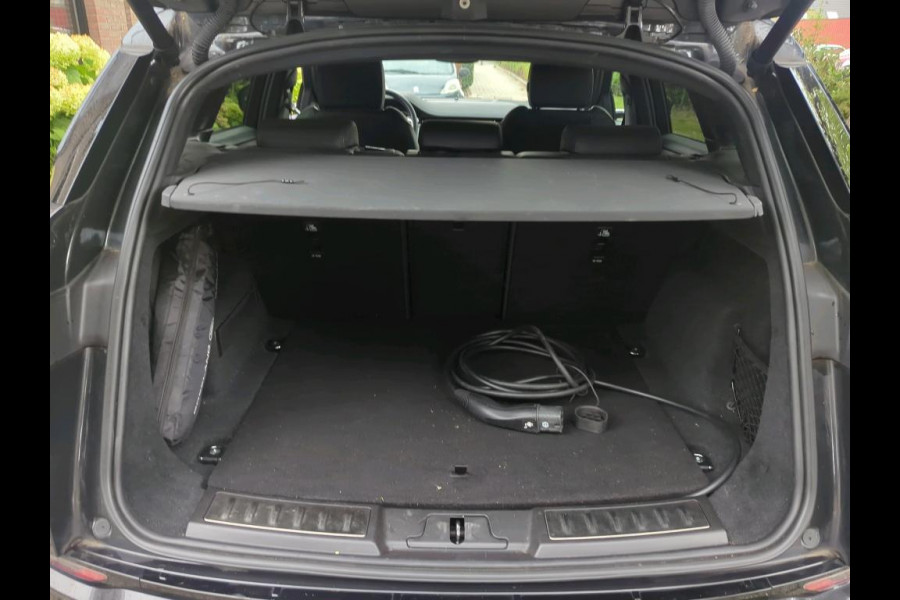 Land Rover Range Rover Evoque 1.5 P300e AWD R-Dynamic SE | Stoelverwarming | Camera | Apple Carplay | Navigatie | Keyless | Dodehoekdetectie | Ambiance Verlichting | Trekhaak | Parkeersensoren | LED |