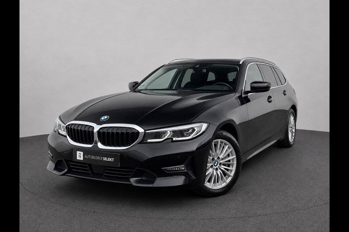 BMW 3 Serie Touring 330e xDrive | Laser | Trekhaak | Head Up | 360 | Sfeerverlichting | Dodehoek | 1e eigenaar