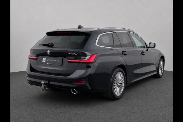BMW 3 Serie Touring 330e xDrive | Laser | Trekhaak | Head Up | 360 | Sfeerverlichting | Dodehoek | 1e eigenaar