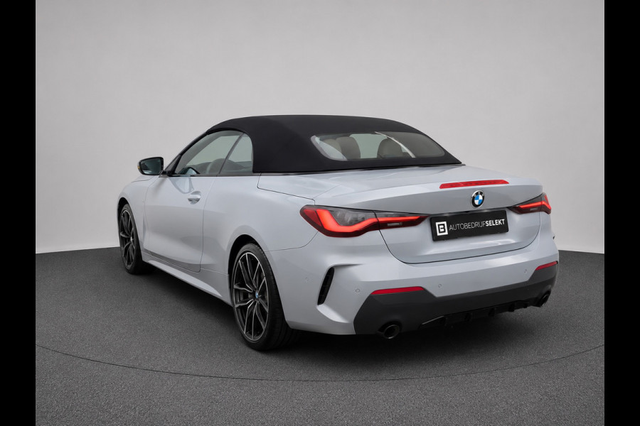 BMW 4 Serie Cabrio 420i M-Sport | Brooklyn Grey | Harman Kardon | 19 inch | Facelift | Widescreen | Stoelverwarming | Carbon