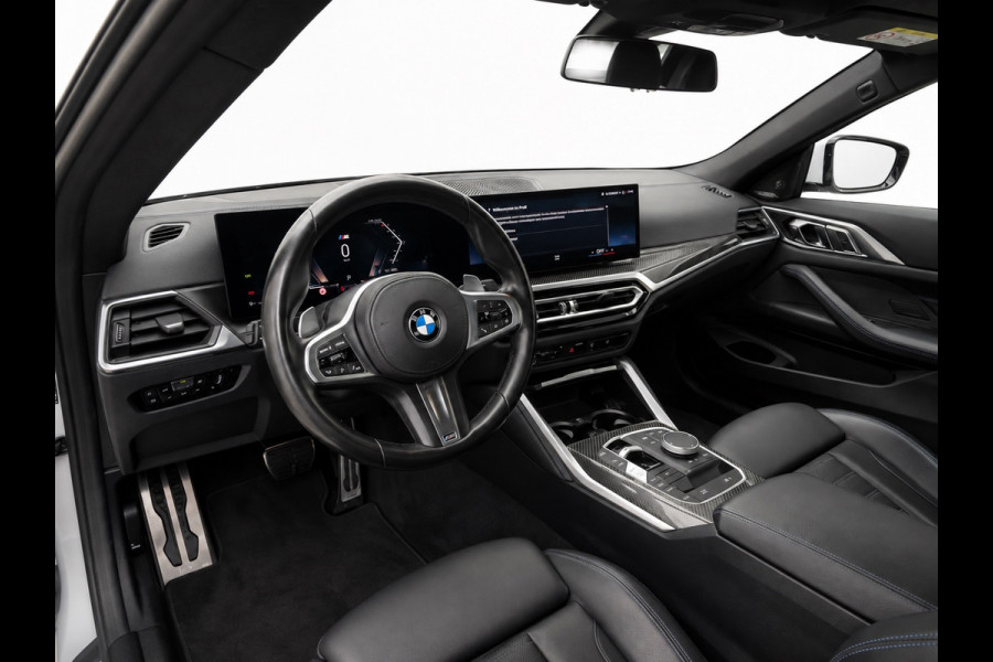 BMW 4 Serie Cabrio 420i M-Sport | Brooklyn Grey | Harman Kardon | 19 inch | Facelift | Widescreen | Stoelverwarming | Carbon