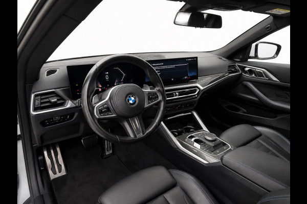 BMW 4 Serie Cabrio 420i M-Sport | Brooklyn Grey | Harman Kardon | 19 inch | Facelift | Widescreen | Stoelverwarming | Carbon